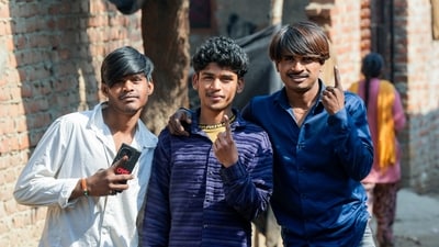 Young Pakistani Hindu refugees display their inked fingers after voting for the first time during the Delhi Assembly elections at the Majnu Ka Tila resettlement colony. (PTI) Young Pakistani Hindu refugees display their inked fingers after voting for the first time during the Delhi Assembly elections at the Majnu Ka Tila resettlement colony. (PTI)