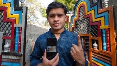 A Pakistani Hindu refugee shows her inked finger after voting for the first time at a resettlement colony in Majnu Ka Tila. (PTI) A Pakistani Hindu refugee shows her inked finger after voting for the first time at a resettlement colony in Majnu Ka Tila. (PTI)