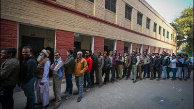 People in queue to cast their vote at a polling centre in Khazoori Khas, New Delhi on Wednesday. (Sanchit Khanna/HT Photo) People in queue to cast their vote at a polling centre in Khazoori Khas, New Delhi on Wednesday. (Sanchit Khanna/HT Photo)