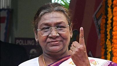 President Droupadi Murmu shows her ink-marked finger after voting in the Delhi assembly elections on Wednesday. (ANI) President Droupadi Murmu shows her ink-marked finger after voting in the Delhi assembly elections on Wednesday. (ANI)