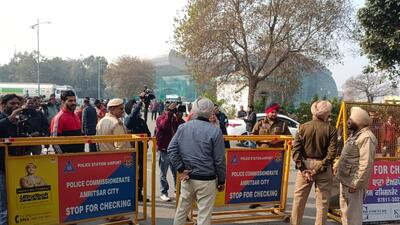 Security stepped up at the Sri Guru Ram Dass Jee International Airport in Amritsar on Wednesday. A US military plane carrying 104 illegal immigrants is to land at the airport in the afternoon. (Sameer Sehgal/HT)