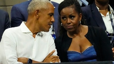 Barack and Michelle Obama attempted to present a unified force in an effort to stem the speculations about their marriage following the ex-president's lonesome attendance (Reuters)