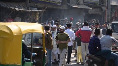 Delhi police and paramilitary forces intervene as clashes erupt between AAP and Congress workers at LNJP Colony near Zakir Hussain College during the Delhi Assembly election voting. (HT photo/ Raj K Raj) Delhi police and paramilitary forces intervene as clashes erupt between AAP and Congress workers at LNJP Colony near Zakir Hussain College during the Delhi Assembly election voting. (HT photo/ Raj K Raj)