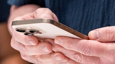 Tim Cook, CEO of Apple with the iPhone 16 Pro in Desert Titanium. (Bloomberg) Tim Cook, CEO of Apple with the iPhone 16 Pro in Desert Titanium. (Bloomberg)