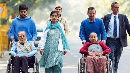 Aam Aadmi Party (AAP) national convener Arvind Kejriwal and his mother Gita Devi, father Gobind Ram Kejriwal, wife Sunita Kejriwal and son Pulkit Kejriwal on their way to cast their vote. (AAP-X)