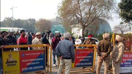 Security stepped up at the Sri Guru Ram Dass Jee International Airport in Amritsar on Wednesday. A US military plane carrying 104 illegal immigrants is to land at the airport in the afternoon. (Sameer Sehgal/HT)