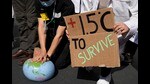 FILE - Demonstrators pretend to resuscitate the Earth while advocating for the 1.5 degree warming goal to survive at the COP27 U.N. Climate Summit, Nov. 16, 2022, in Sharm el-Sheikh, Egypt. (AP Photo/Peter Dejong, File) (AP)