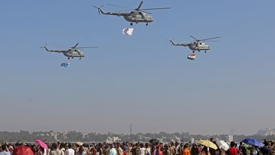 Aero India 2025: People gather to watch the final rehearsal of IAF aircraft at Yelahanka Air Force Station in Bengaluru. (PTI)