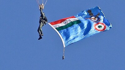 An IAF paraglider performs during final rehearsal ahead of Aero India 2025, at Yelahanka Air Force Station.&nbsp; (PTI)