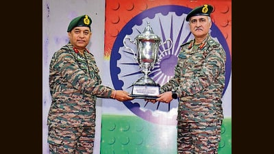 Brigadier VS Chauhan receiving the championship trophy from Major General JS Cheema at NCC Academy, Ropar. (HT Photo)