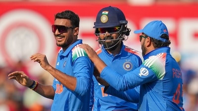 India's Axar Patel, left, celebrates with captain Rohit Sharma, right, and wicketkeeper KL Rahul after taking the wicket of England's captain Jos Buttler during the first One Day International (ODI) cricket match (PTI) India's Axar Patel, left, celebrates with captain Rohit Sharma, right, and wicketkeeper KL Rahul after taking the wicket of England's captain Jos Buttler during the first One Day International (ODI) cricket match (PTI)