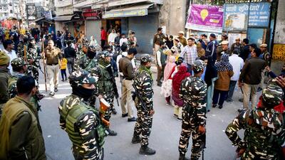 Security personnel outside a polling station for the Delhi assembly elections on Wednesday. (ANI Photo) Security personnel outside a polling station for the Delhi assembly elections on Wednesday. (ANI Photo)