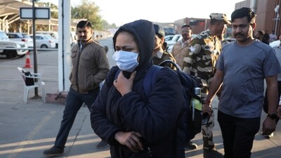 An Indian immigrant deported from the US walks out of Ahmedabad Airport on February 6, 2025. Upon arrival, the 33 deportees, including children and women, were transported to their hometowns in Gujarat in police vehicles, according to the Assistant Commissioner of Police, 'G' Division. (Reuters)
