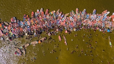 The Maha Kumbh Mela 2025 began on January 13, 2025, with the Paush Purnima Snan, and will conclude on February 26, 2025, aligning with Maha Shivratri. In pic: Devotees take a holy dip at the Sangam during the ongoing Maha Kumbh Mela 2025, in Prayagraj, Uttar Pradesh. (PTI) The Maha Kumbh Mela 2025 began on January 13, 2025, with the Paush Purnima Snan, and will conclude on February 26, 2025, aligning with Maha Shivratri. In pic: Devotees take a holy dip at the Sangam during the ongoing Maha Kumbh Mela 2025, in Prayagraj, Uttar Pradesh. (PTI)