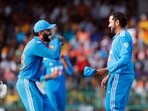 India's captain Rohit Sharma and Virat Kohli celebrate a wicket India's captain Rohit Sharma and Virat Kohli celebrate a wicket