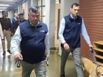FILE: A bomb squad team search a school after several schools received a bomb threats, in Noida, FILE: A bomb squad team search a school after several schools received a bomb threats, in Noida,