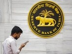 A man walks past the RBI logo at RBI headquarters in Mumbai, Friday, Feb. 7, 2025. A man walks past the RBI logo at RBI headquarters in Mumbai, Friday, Feb. 7, 2025.