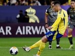 Al Nassr's Cristiano Ronaldo scores their second goal from the penalty spot vs Al Wasl in the Asian Champions League.