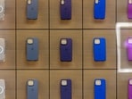 Protective cases for iPhone handsets on display in an Apple Inc. store in central London, UK. The new iPhone SE is due in coming days