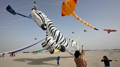 Visitors also participate in kite-making workshops, where they can learn how to make their own kites and decorate them with unique designs. (AFP) Visitors also participate in kite-making workshops, where they can learn how to make their own kites and decorate them with unique designs. (AFP)