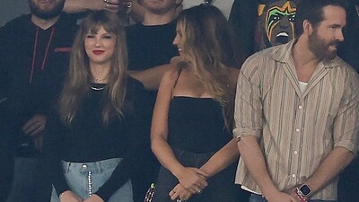 In front, from left, Taylor Swift, Blake Lively and Ryan Reynolds stand for the national anthem before an NFL football game between the New York Jets and the Kansas City Chiefs, Sunday, Oct. 1, 2023, in East Rutherford, N.J. (AP Photo/Adam Hunger) (AP) In front, from left, Taylor Swift, Blake Lively and Ryan Reynolds stand for the national anthem before an NFL football game between the New York Jets and the Kansas City Chiefs, Sunday, Oct. 1, 2023, in East Rutherford, N.J. (AP Photo/Adam Hunger) (AP)