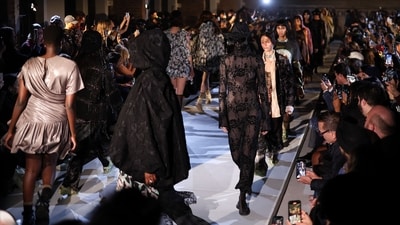 Models shine in Siriano's glamorous collection inspired by cars at New York Fashion Week. (AFP) Models shine in Siriano's glamorous collection inspired by cars at New York Fashion Week. (AFP)
