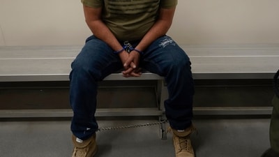 The federal Bureau of Prisons announced Friday that President Donald Trump's administration is reverting to a practice that sparked accusations of abuse during his first term by utilising federal prisons to house some of the individuals detained in its immigration operation. (AP/Damian Dovarganes) The federal Bureau of Prisons announced Friday that President Donald Trump's administration is reverting to a practice that sparked accusations of abuse during his first term by utilising federal prisons to house some of the individuals detained in its immigration operation. (AP/Damian Dovarganes)
