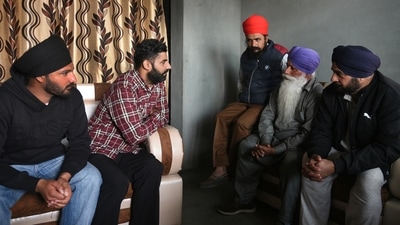 Jaspal Singh, 36, second left, one of the Indian immigrants deported by the United States talks to his relatives upon his return to his home near Amritsar, India, Thursday, Feb. 6, 2025. (AP) Jaspal Singh, 36, second left, one of the Indian immigrants deported by the United States talks to his relatives upon his return to his home near Amritsar, India, Thursday, Feb. 6, 2025. (AP)