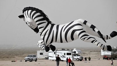 This annual family-friendly event is free and open to all, showcasing a stunning array of kites in the skies over Kuwait's beautiful Bnaider desert (AFP) This annual family-friendly event is free and open to all, showcasing a stunning array of kites in the skies over Kuwait's beautiful Bnaider desert (AFP)