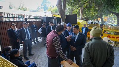 Lawyers from the legal cell of Aam Admi Party seen outside the residence of Arvind Kejriwal as a team of Anti Corruption Bureau arrives at his residence in New Delhi, India, on Friday. (Sanchit Khann/HT) Lawyers from the legal cell of Aam Admi Party seen outside the residence of Arvind Kejriwal as a team of Anti Corruption Bureau arrives at his residence in New Delhi, India, on Friday. (Sanchit Khann/HT)
