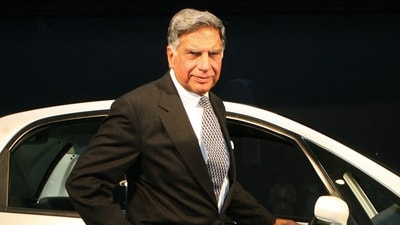 Tata Group's Ratan Tata poses in front of the Tata Nano in New Delhi. (AFP file) Tata Group's Ratan Tata poses in front of the Tata Nano in New Delhi. (AFP file)