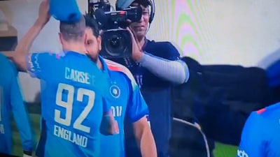 Brydon Carse takes his cap off before shaking hands with Rohit Brydon Carse takes his cap off before shaking hands with Rohit