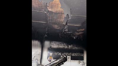The Aam Aadmi Clinic that was destroyed in a fire at Chhawni Mohalla in Ludhiana on Friday. (HT Photo)