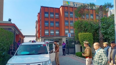 Noida: Senior police officers at the Shiv Nadar School, which received a bomb threat, in Noida, on Friday (PTI) Noida: Senior police officers at the Shiv Nadar School, which received a bomb threat, in Noida, on Friday (PTI)