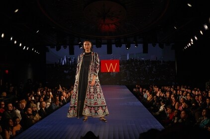A floor-length dress with a long jacket