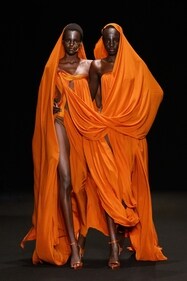 Each piece was a testament to the fusion of craftsmanship and innovation, featuring intricate embroideries, flame-like structures, and a palette that ignites the senses.