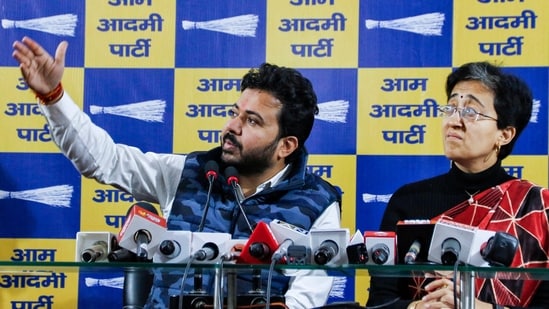 Aam Aadmi Party (AAP) MLA Durgesh Pathak with Delhi Chief Minister Atishi addresses a press conference, at party office in New Delhi on Monday. ((ANI Photo))
