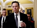 Elon Musk walks on Capitol Hill on the day of a meeting with Senate Republican Leader-elect John Thune (R-SD), in Washington, U.S. December 5, 2024. 