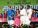 Thiruvananthapuram: Kerala Minister for General Education V Sivankutty and others present a memento to the students of Wayanads Vellarmala government school during the inauguration of the 63rd Kerala State School Arts Festival in Thiruvananthapuram on Saturday.