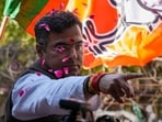 BJP candidate from New Delhi assembly constituency Parvesh Verma celebrates outside a counting center after claiming victory in the Delhi assembly polls amid the counting of votes in New Delhi.