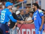 England's captain Jos Buttler (L) shakes hands with his India's counterpart Rohit Sharma at the end of the first ODI. England's captain Jos Buttler (L) shakes hands with his India's counterpart Rohit Sharma at the end of the first ODI.