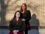 Mellow, a transgender woman, left, poses for a portrait with her mother, Lisa Suhay, Monday, Feb. 3, 2025, in Norfolk, Va. 