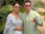 Priyanka Chopra and Nick Jonas greet the paparazzi. Priyanka Chopra and Nick Jonas greet the paparazzi.