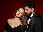 Sonakshi Sinha epitomizes elegance in a Mason Tai dress paired with earrings and rings from CaratLane. Zaheer complements her in a black tux from Ashish Soni.