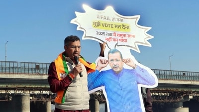 BJP candidate from the New Delhi assembly constituency Parvesh Verma submerges a cut-out of AAP national convener Arvind Kejriwal in the Yamuna River to protest over the issue of cleaning the Yamuna. (HT Photo) BJP candidate from the New Delhi assembly constituency Parvesh Verma submerges a cut-out of AAP national convener Arvind Kejriwal in the Yamuna River to protest over the issue of cleaning the Yamuna. (HT Photo)