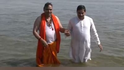 During the current Maha Kumbh Mela in Prayagraj on Saturday, Chief Ministers Bhajanlal Sharma of Rajasthan and Mohan Yadav of Madhya Pradesh had a sacred plunge at the Triveni Sangam. (ANI) During the current Maha Kumbh Mela in Prayagraj on Saturday, Chief Ministers Bhajanlal Sharma of Rajasthan and Mohan Yadav of Madhya Pradesh had a sacred plunge at the Triveni Sangam. (ANI)