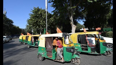 Auto drivers in support of BJP celebrate the party's win in the Delhi Assembly elections on Saturday. (HT PHOTO) Auto drivers in support of BJP celebrate the party's win in the Delhi Assembly elections on Saturday. (HT PHOTO)