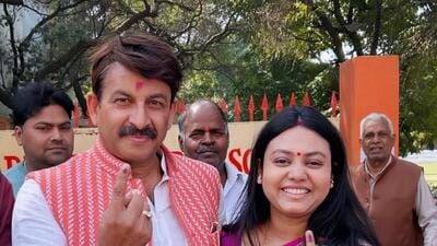 BJP MP from Delhi North East seat Manoj Tiwari and his wife Surabhi Tiwari on February 5. (HT Photo) BJP MP from Delhi North East seat Manoj Tiwari and his wife Surabhi Tiwari on February 5. (HT Photo)