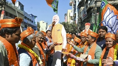 BJP workers celebrate the party's victory in Delhi Assembly polls and UP's Milkipur by-election in Varanasi on Saturday. (PTI) BJP workers celebrate the party's victory in Delhi Assembly polls and UP's Milkipur by-election in Varanasi on Saturday. (PTI)