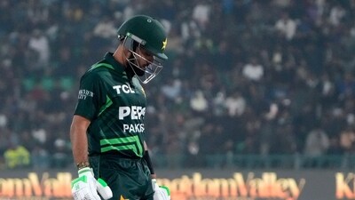 Pakistan's Babar Azam walks off the field after his dismissal during the tri-series ODI cricket match between Pakistan and New Zealand at Gaddafi Stadium in Lahore. (AP) Pakistan's Babar Azam walks off the field after his dismissal during the tri-series ODI cricket match between Pakistan and New Zealand at Gaddafi Stadium in Lahore. (AP)